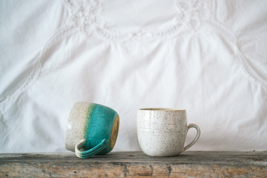 Speckle mugs in  two tones, white, and half and half 