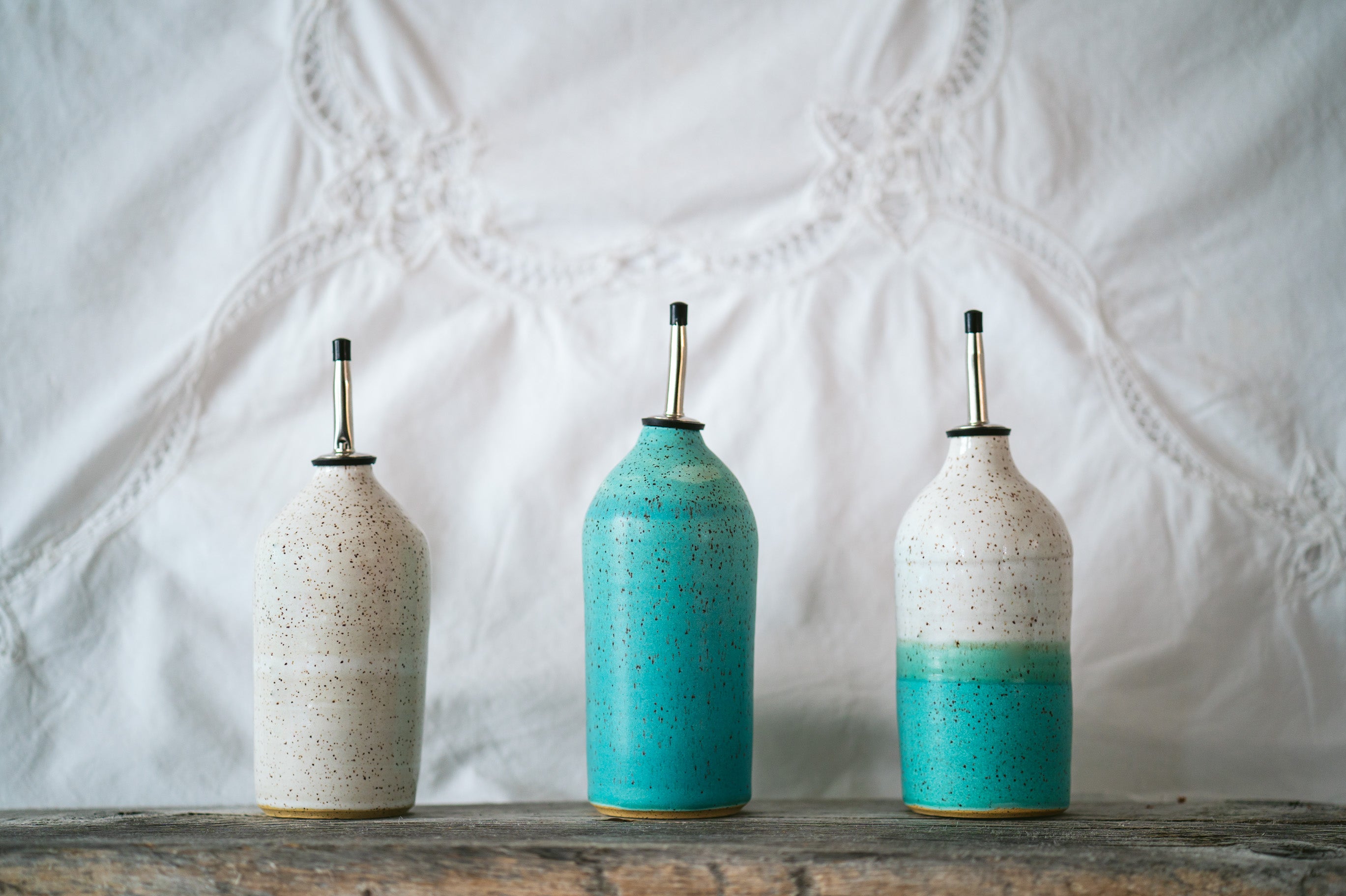 Speckle oil dispenser in white, robin egg and half and half