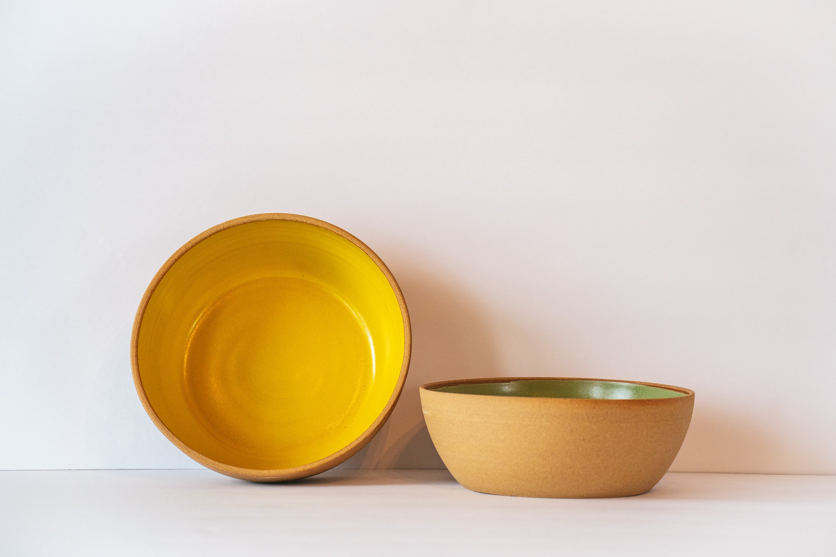 Yellow shallow bowl for pasta