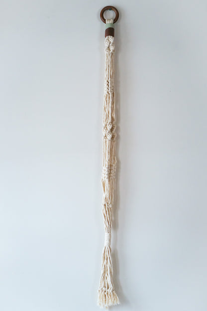 Macramé hanger with bead