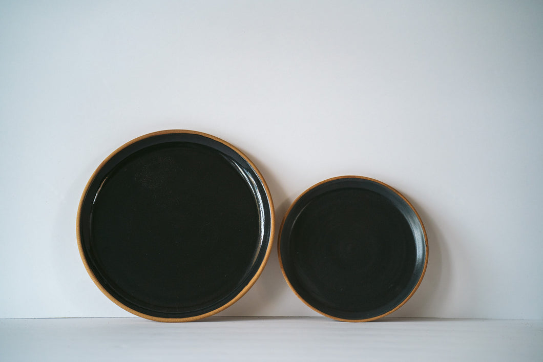 Black dinner and side plate