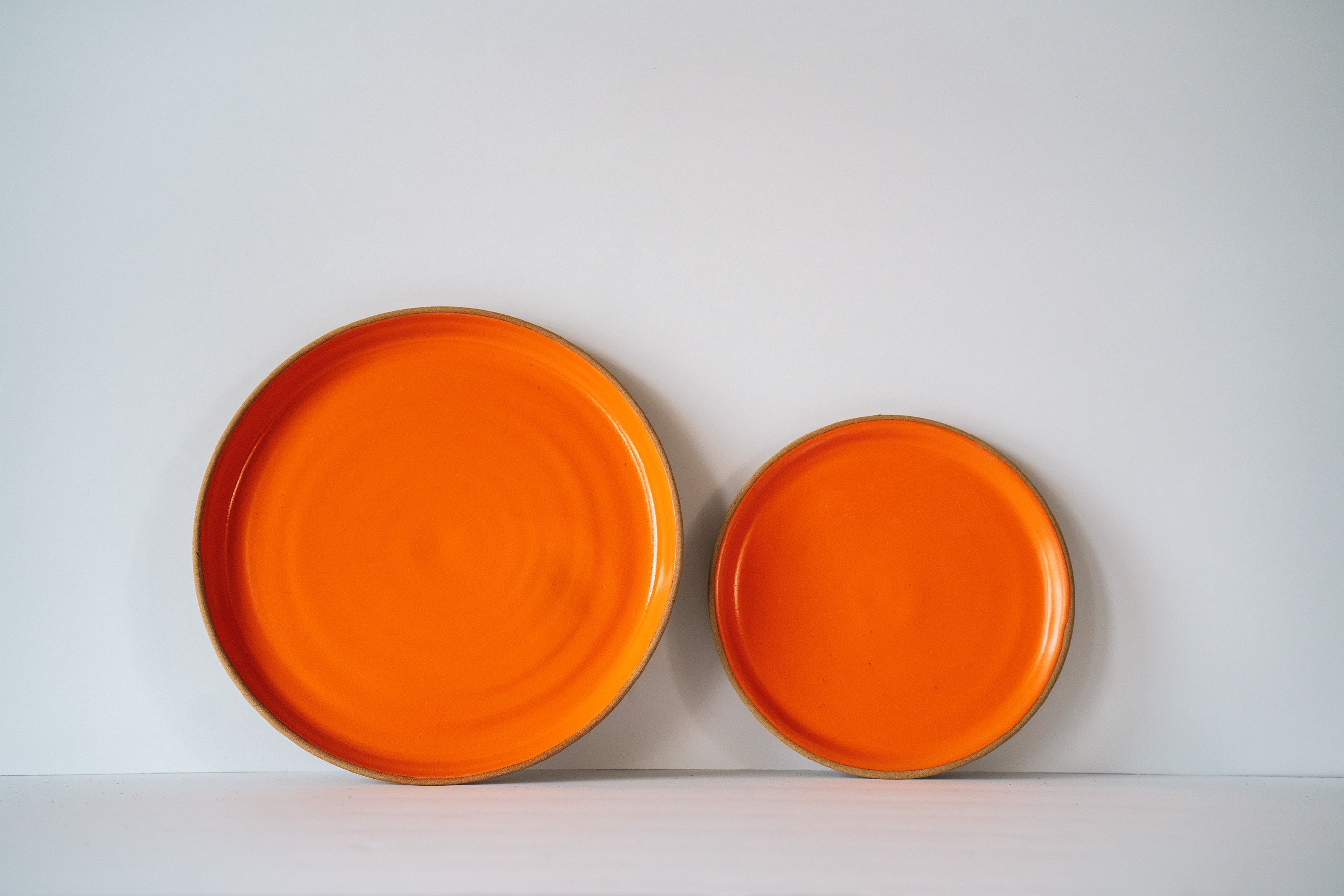 Orange dinner and side plate