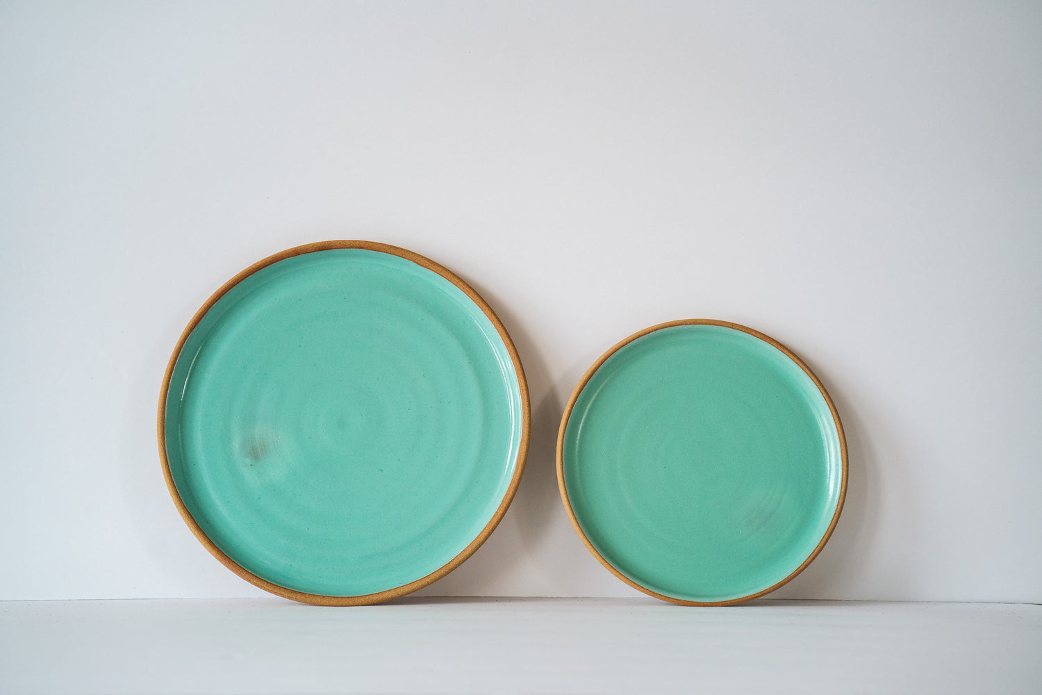 Turquoise dinner and side plate