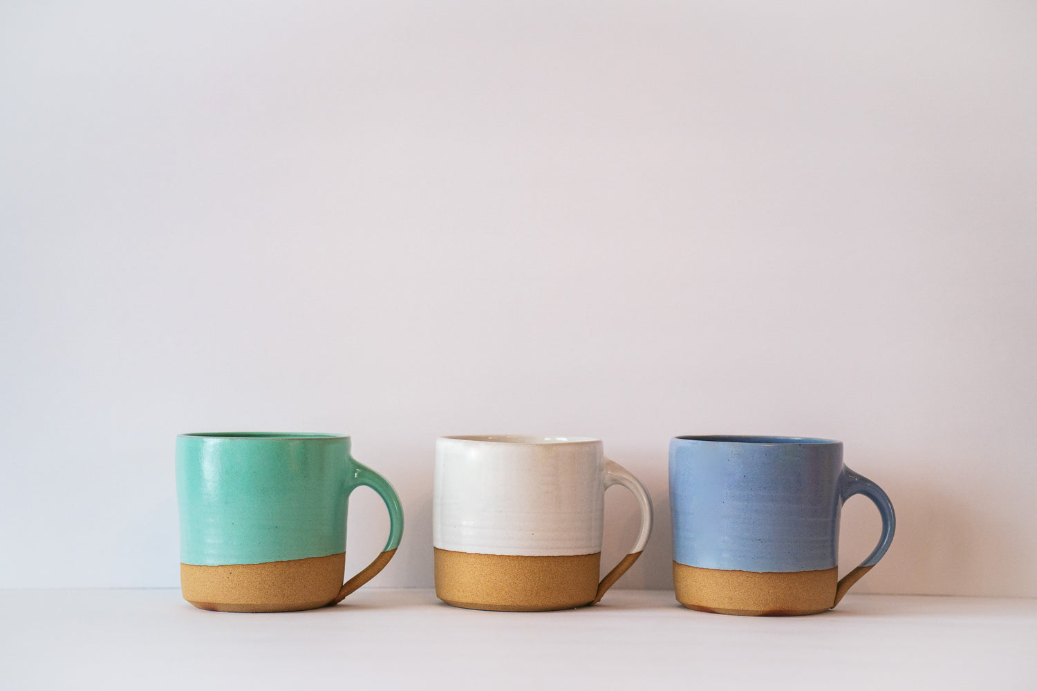 short mug in turquoise, white and lavender