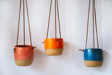 Load image into Gallery viewer, Small hanging planter in coral, orange and dark blue
