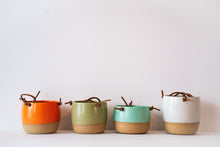 Load image into Gallery viewer, Small hanging planter in orange, avocado, turquoise and white
