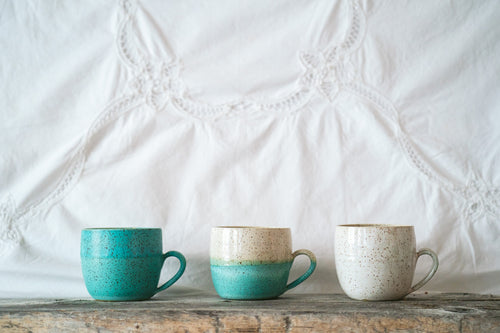 Speckle mugs in three tones, robin egg, half and half and white