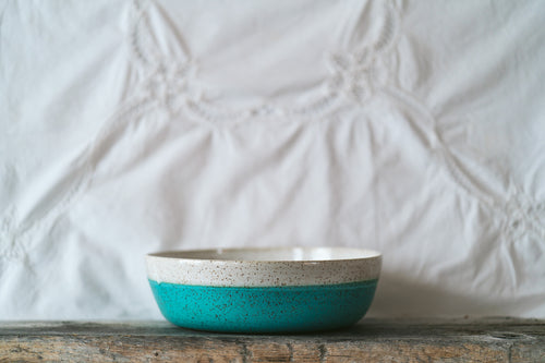 Wide speckle serving bowl in half and half