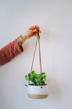 Load image into Gallery viewer, Wide hanging planter with plant in white
