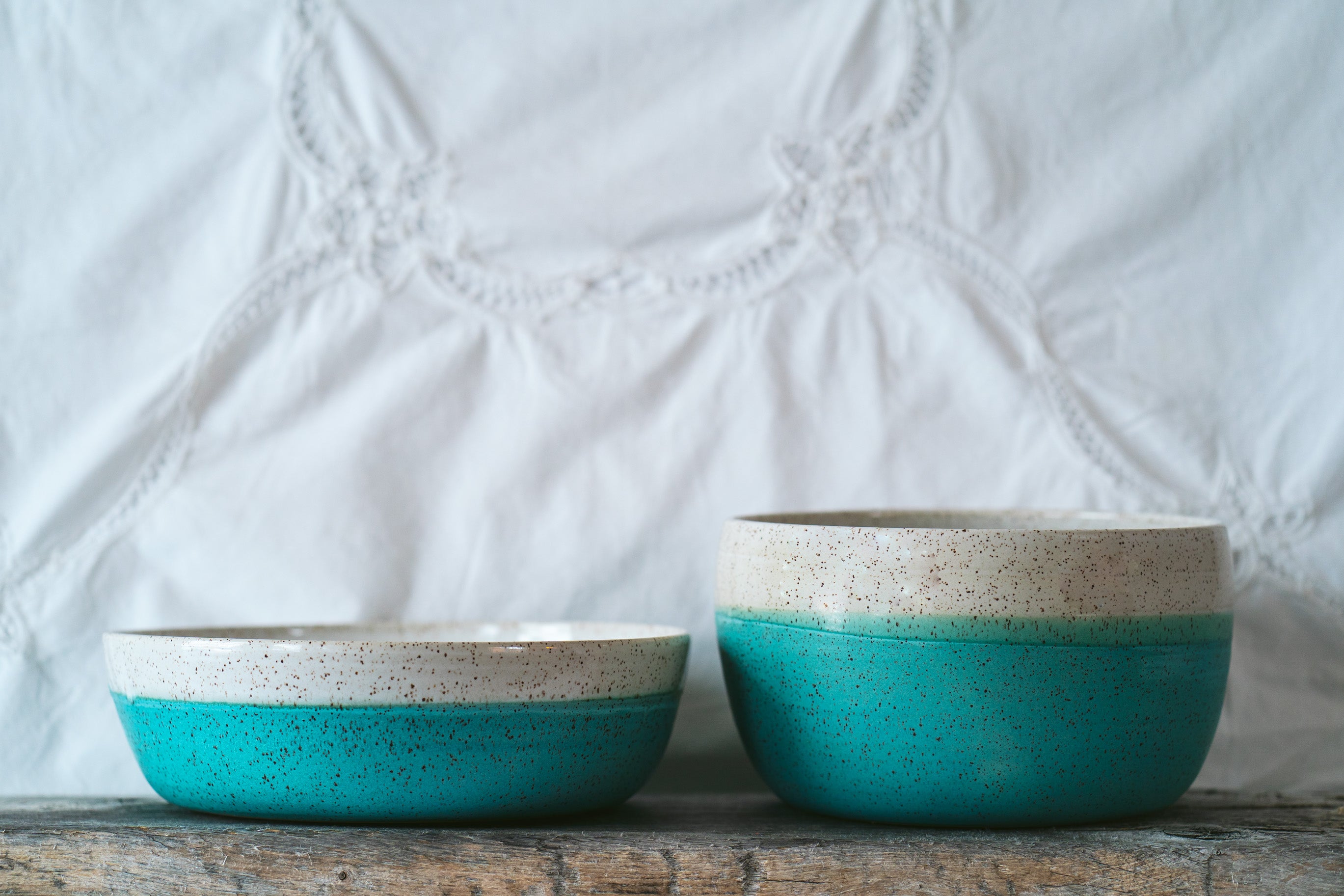 Shallow and large serving bowl in half and half speckle