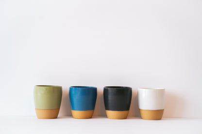 Line up of small tumblers in different tones